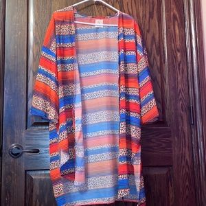 A sarape and cheetah cardigan.